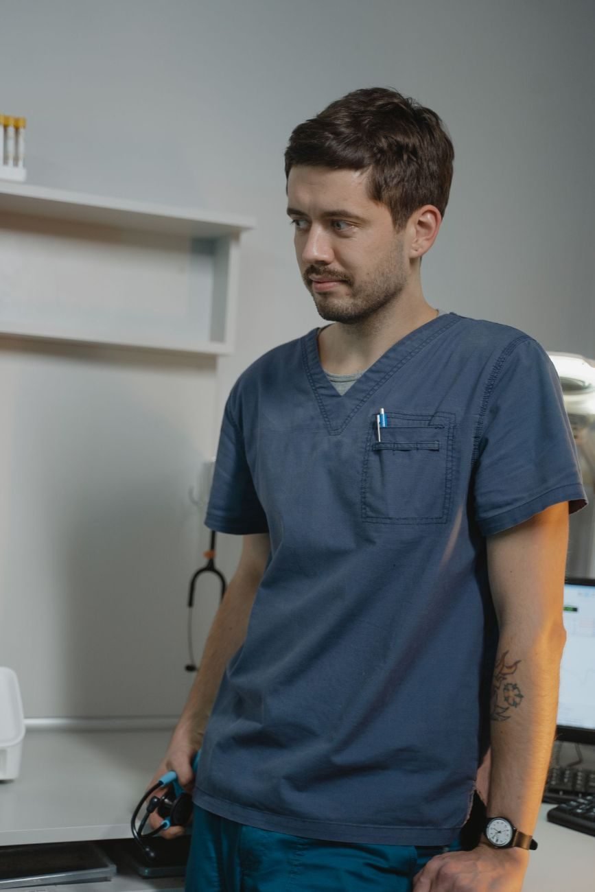 Young doctor in scrubs